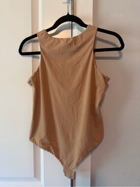 SKIMS Sleeveless Scoop-Neck Bodysuit in Tan